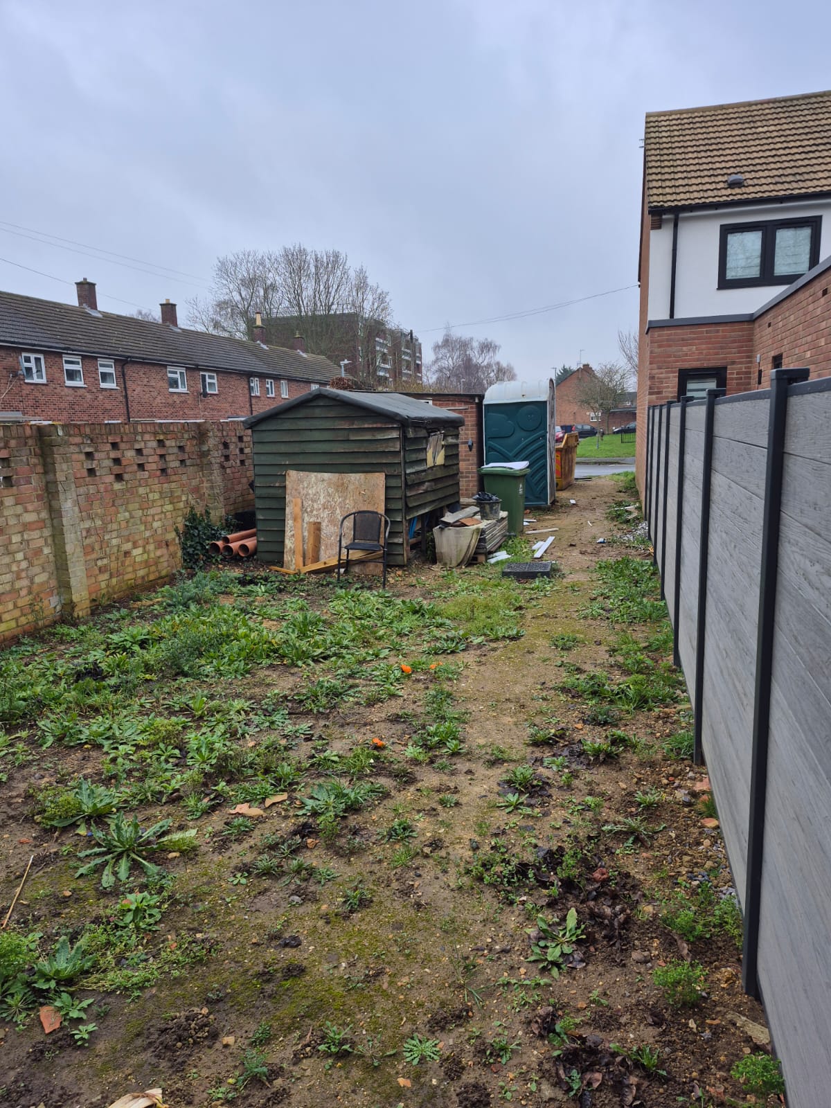 Groundworks project before — overgrown garden site in Cambridge