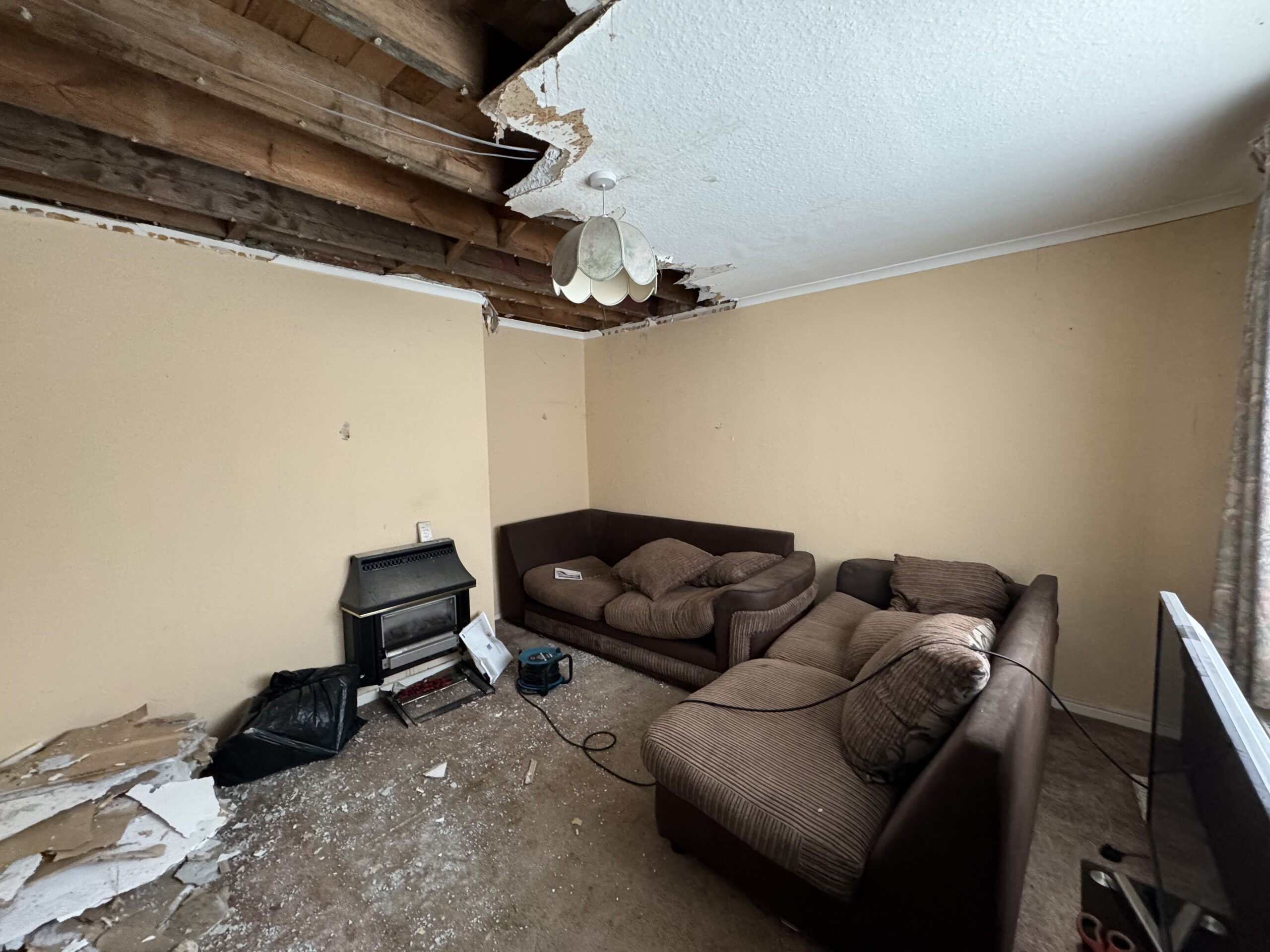 Strip-out project before — furnished room before demolition